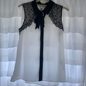 Black and white blouse with lace and tie